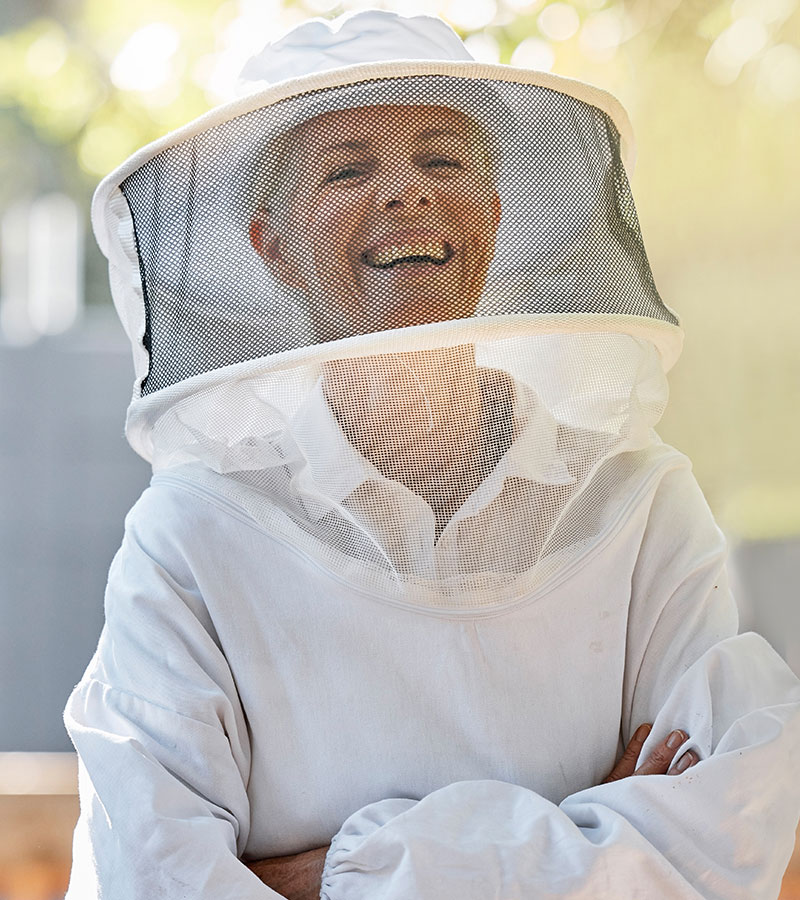 beekeeper farmer and happy portrait of woman with 9RY5CYU Asociatia Crescatorilor de albine din Romania Filiala Timis